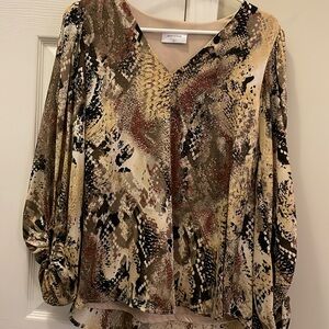 Long sleeved snake print blouse. EUC